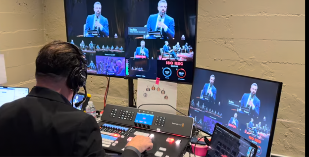 Argus HD video switcher position during the live distribution of The Ezra Klein Show, with a seven-camera multiviewer and Ezra Klein lower-third graphic on program.