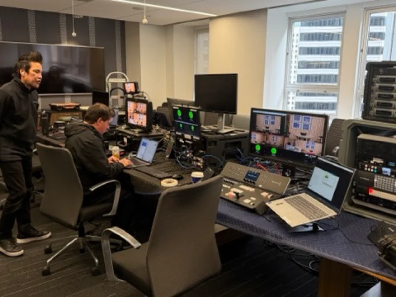 Argus HD operator running a live webcast switcher and encoding rack